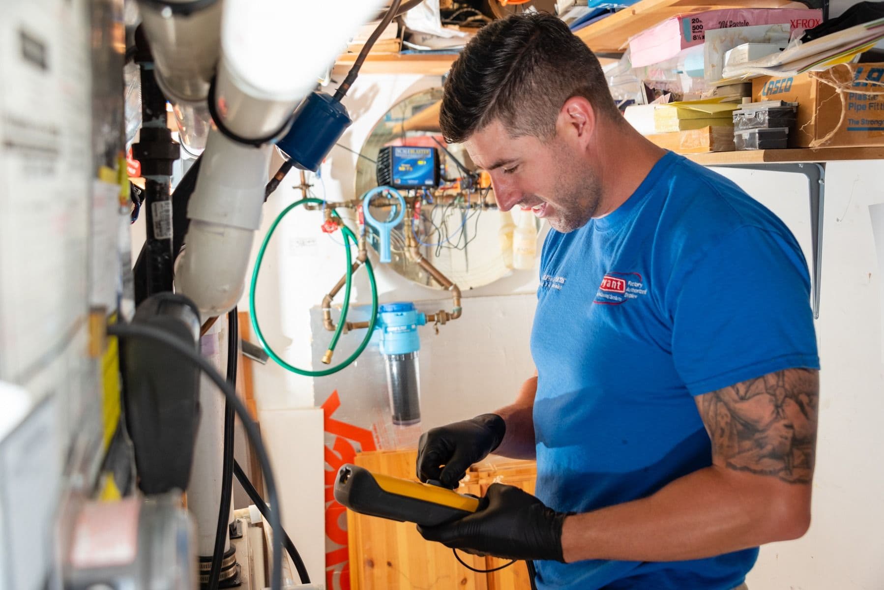 Technician-Luke-Analyzing-Heater-Philadelphia-Gas-Electric-Heating